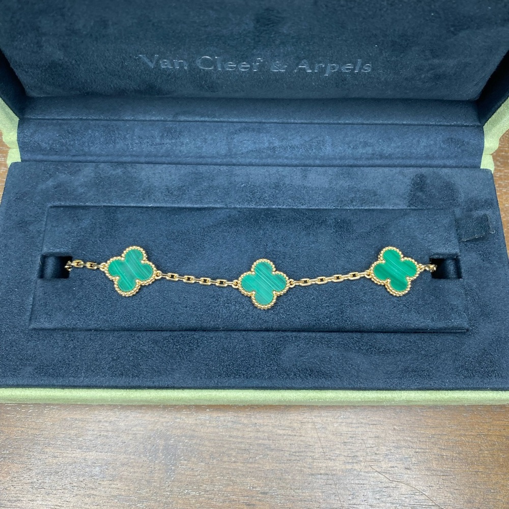 Van cleef and arpels malachite 18k gold 5 motif bracelet.